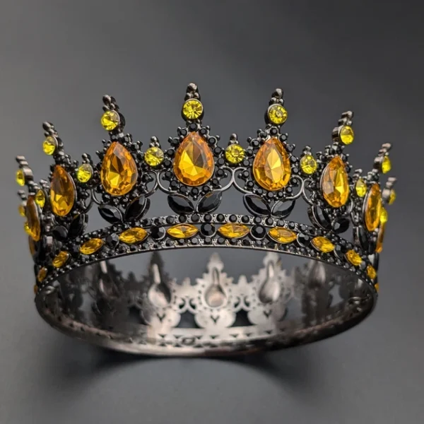 Корона чорна з жовтим камінням.